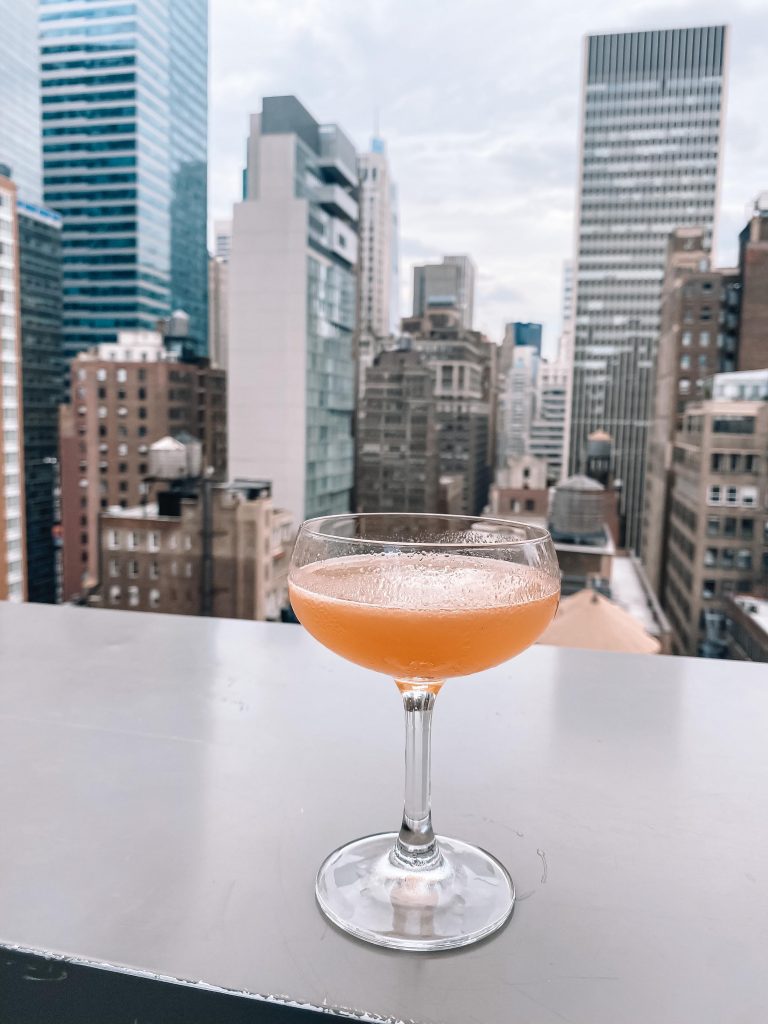 Things to do in NYC: View of a drink at the Castell Rooftop Bar in NYC